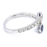Anillo con zafiro y diamantes en oro blanco 14KT