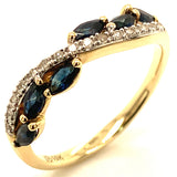 Anillo con zafiro y diamantes en oro amarillo 10KT