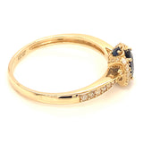 Anillo con zafiro y diamantes en oro amarillo 14KT