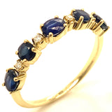Anillo con zafiro y diamantes en oro amarillo 14KT