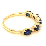 Anillo con zafiro y diamantes en oro amarillo 14KT