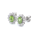 Aretes con peridoto y diamantes en oro blanco 10kt