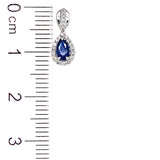 Aretes con zafiro y diamantes en oro blanco 14kt