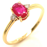 Anillo con rubí y diamantes en oro amarillo 14KT