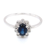 Anillo con zafiro y diamantes en oro blanco 14KT