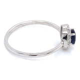 Anillo con zafiro y diamantes en oro blanco 14KT