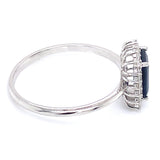Anillo con zafiro y diamantes en oro blanco 14KT