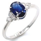Anillo con zafiro y diamantes en oro blanco 14KT