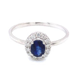 Anillo con zafiro y diamantes en oro blanco 14KT