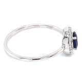 Anillo con zafiro y diamantes en oro blanco 14KT