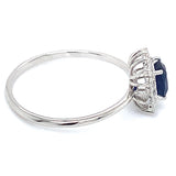 Anillo con zafiro y diamantes en oro blanco 14KT