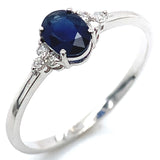 Anillo con zafiro y diamantes en oro blanco 14KT