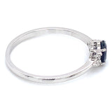 Anillo con zafiro y diamantes en oro blanco 14KT