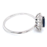 Anillo con zafiro y diamantes en oro blanco 14KT