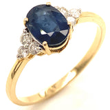 Anillo con zafiro y diamantes en oro amarillo 14KT
