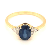 Anillo con zafiro y diamantes en oro amarillo 14KT