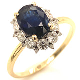 Anillo con zafiro y diamantes en oro amarillo 14KT