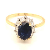 Anillo con zafiro y diamantes en oro amarillo 14KT