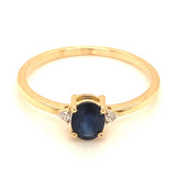 Anillo con zafiro y diamantes en oro amarillo 14KT