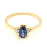 Anillo con zafiro y diamantes en oro amarillo 14KT