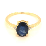 Anillo con zafiro y diamantes en oro amarillo 14KT