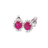 Aretes con rubí en oro blanco 14KT
