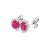 Aretes con rubí en oro blanco 14KT