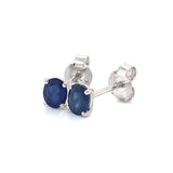 Aretes con zafiro en oro blanco 14KT