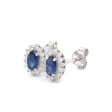 Aretes con zafiro y diamantes en oro blanco 14KT
