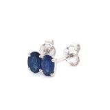 Aretes con zafiro en oro blanco 14KT