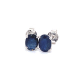 Aretes con zafiro en oro blanco 14KT