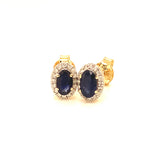 Aretes con zafiro y diamantes en oro amarillo 14KT