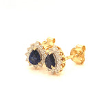 Aretes con zafiro y diamantes en oro amarillo 14KT