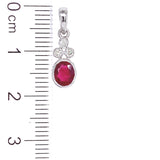 Dije con rubí y diamantes en oro blanco 14KT