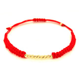 Pulsera (cordón rojo ajustable) en amarillo 10KT