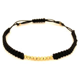 Pulsera (cordón negro ajustable) en amarillo 10KT