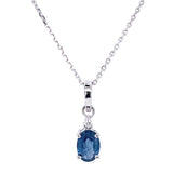 Juego con zafiro y diamantes en oro blanco 10KT