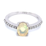 Anillo con ópalo y diamantes en plata 925