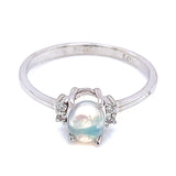 Anillo con ópalo y diamantes en plata 925