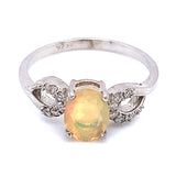Anillo con ópalo y diamantes en plata 925