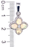 Dije con ópalo y diamantes en plata 925