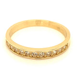 Banda con circones en oro amarillo 10KT
