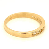 Banda con circones en oro amarillo 10KT