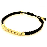 Pulsera (cordón negro ajustable) en amarillo 10KT