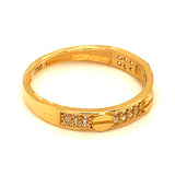 Banda con circones en oro amarillo 18k