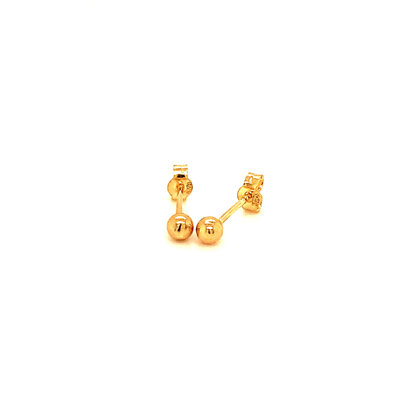 Aretes (bolitas lisas) en oro amarillo 18kt.