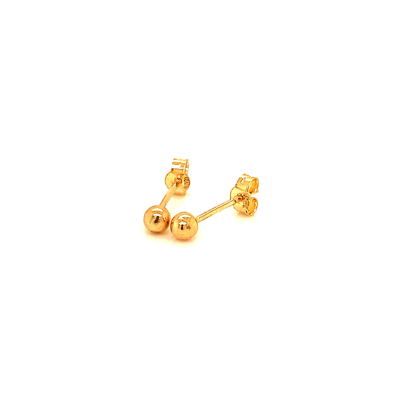 Aretes (bolitas lisas) en oro amarillo 18kt.
