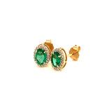 Aretes con esmeralda en oro amarillo 14k.