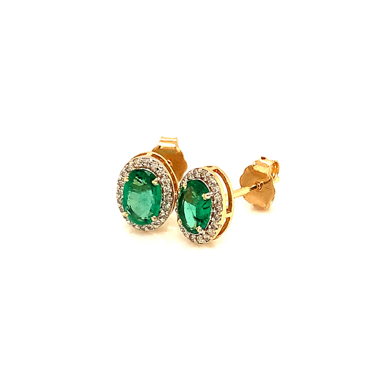Aretes con esmeralda en oro amarillo 14k.
