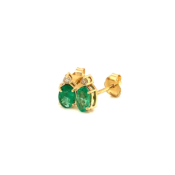 Aretes con esmeralda en oro amarillo 14k.